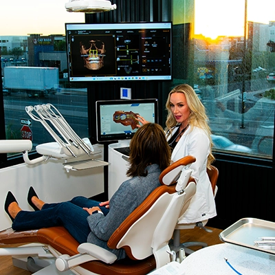 Cosmetic Dentistry Prizm Dental Patient smiling after cosmetic dental care