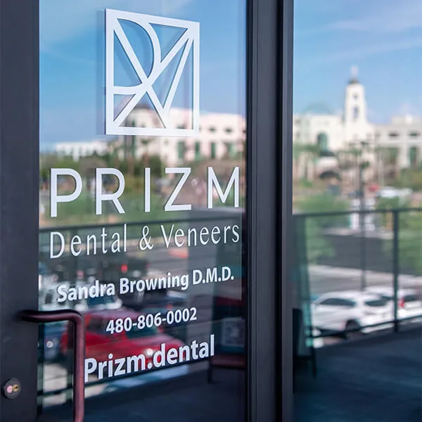 A member of Prizm Dental team smiling