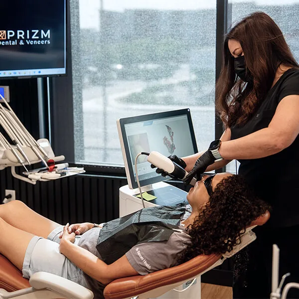 Prizm Dental team members smiling
